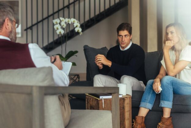 The Importance of Family Support in Recovery couple in session with counselor after learning the importance of family support in recovery