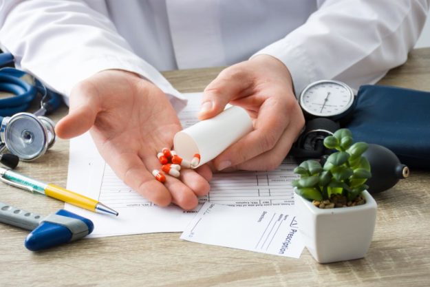 What Is Pharmacotherapy Treatment_ pills in a bottle