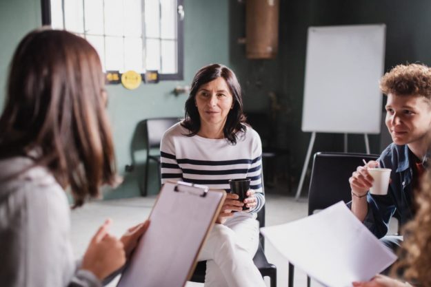 Finding a Depression Center near Lebanon, PA therapist and group of patients discussing finding a depression center near lebanon pa