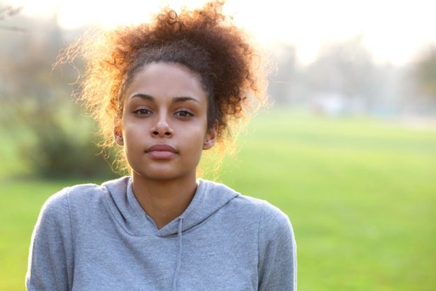 What is Vivitrol_ young woman looking seriously into the camera while standing outside in a field and asking what is vivitrol