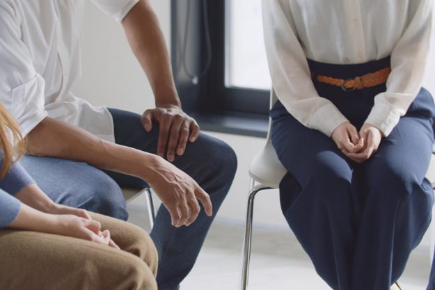 How Intensive Outpatient Programs Treat Substance Abuse group of men and women sitting in a circle learning how intensive outpatient programs treat substance abuse