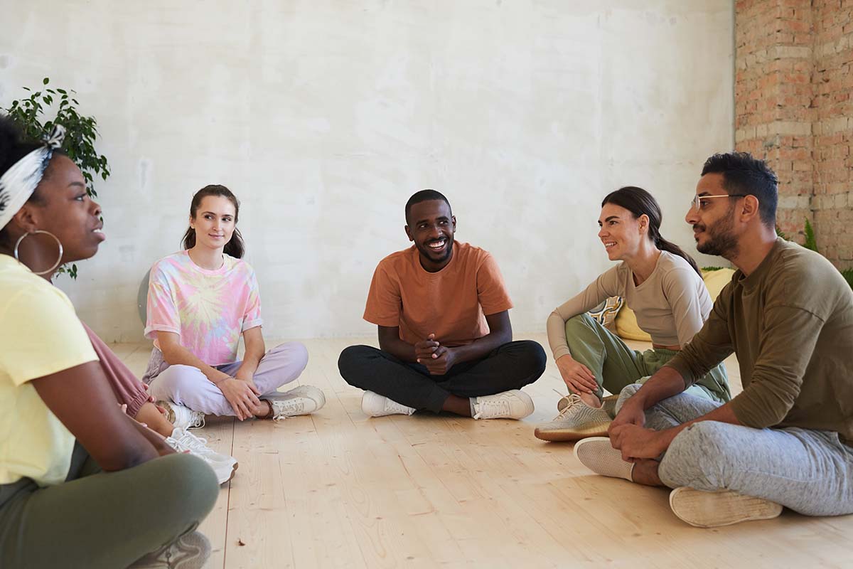 Whats the Difference Partial Hospitalization vs Day Treatment Programs group of clients discussing whats the difference partial hospitalization vs day treatment programs