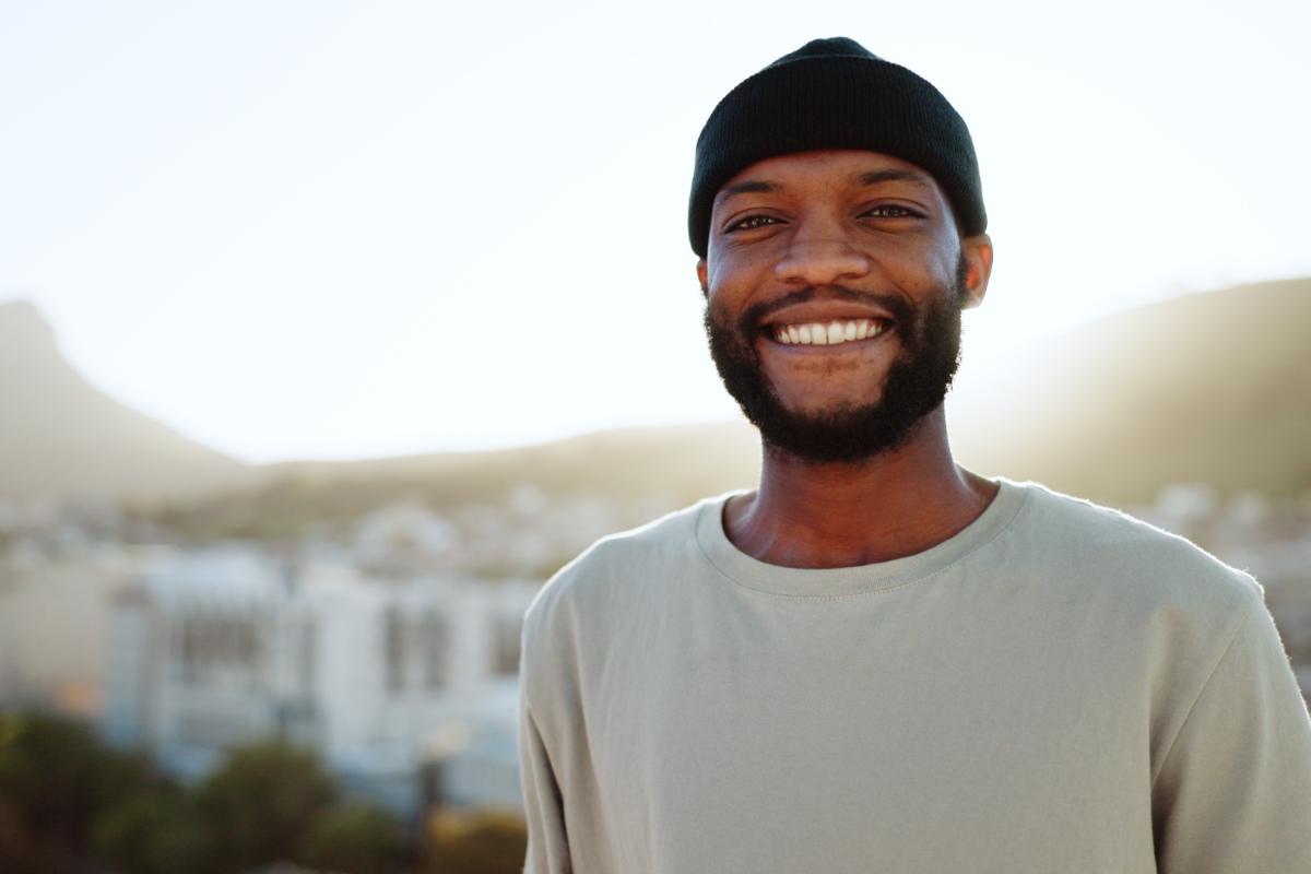 Benefits of an Alcohol Detox a person smiles to show the benefits of an alcohol detox