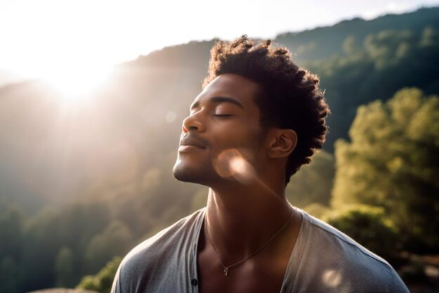 How Can Intensive Outpatient Programs Help_ a person smiles outside to show how can intensive outpatient programs help