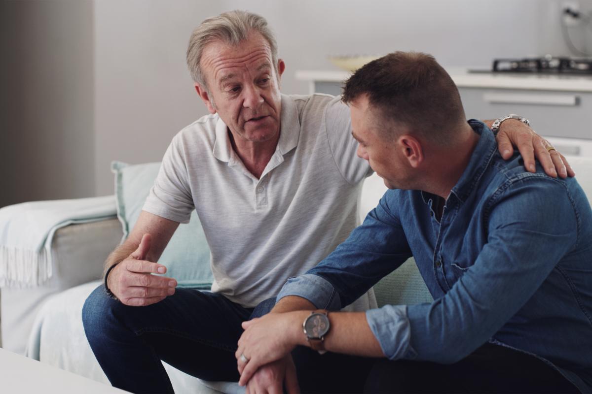 Helping a Loved One with Cocaine Addiction person sitting on couch helping a loved one with cocaine addiction