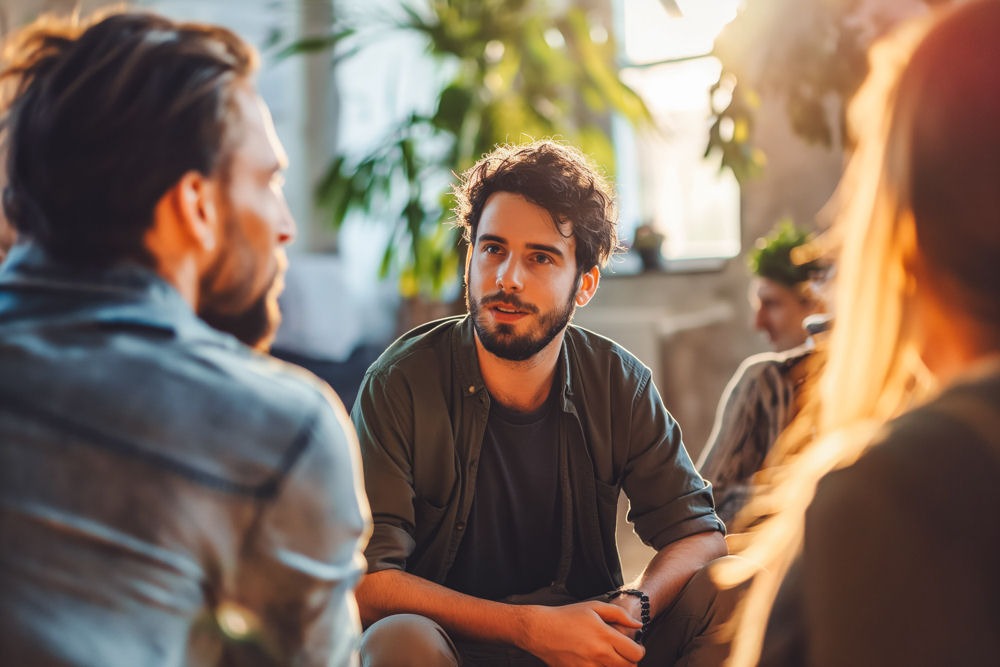 a man in group therapy